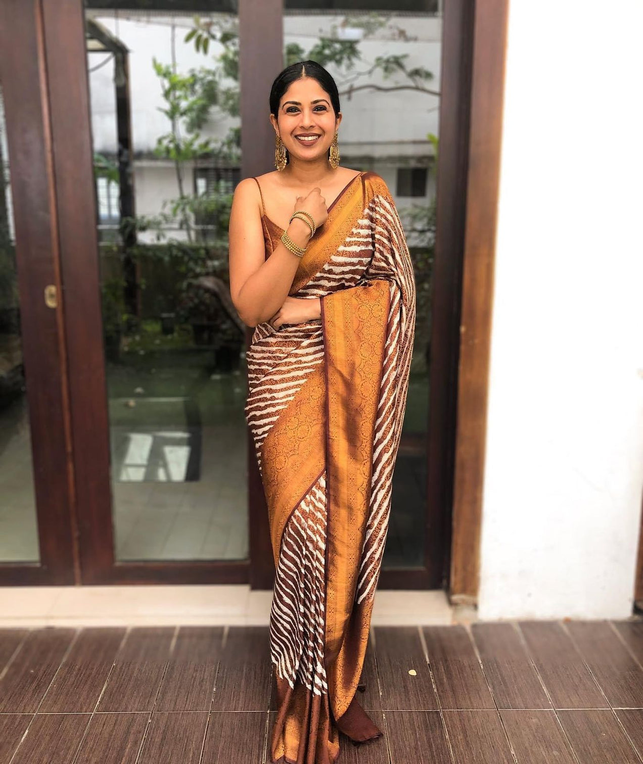 Pleasurable Brown Soft Banarasi Silk Saree With Magnetic Blouse Piece