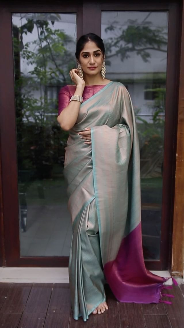 Conflate Sea Green Soft Silk Saree with Cynosure Blouse Piece