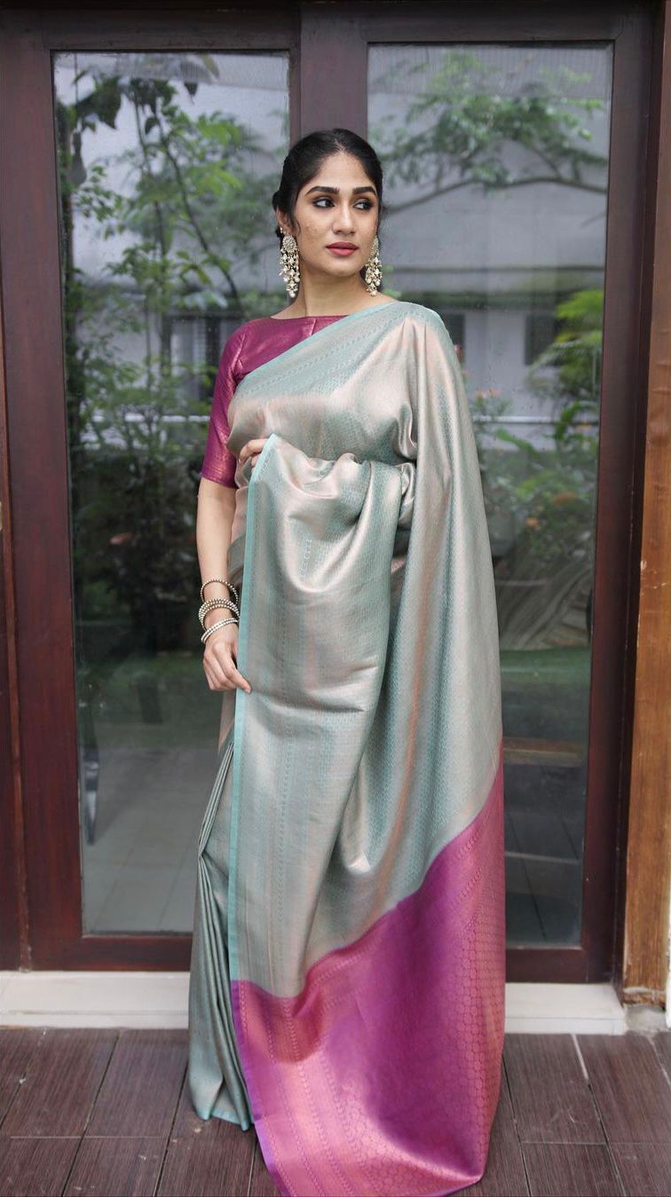 Conflate Sea Green Soft Silk Saree with Cynosure Blouse Piece