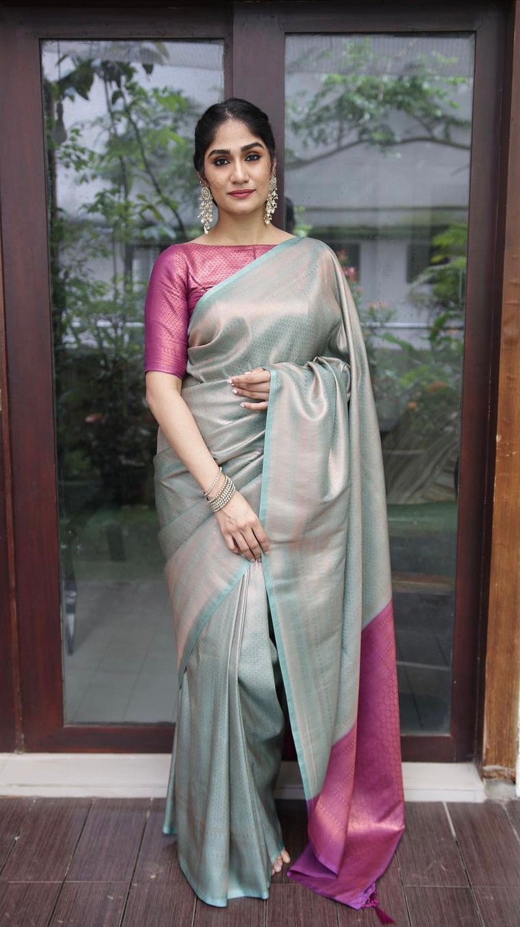 Conflate Sea Green Soft Silk Saree with Cynosure Blouse Piece