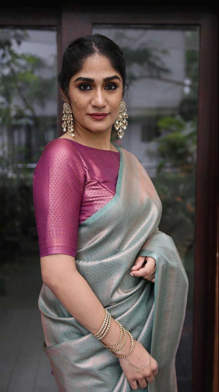 Conflate Sea Green Soft Silk Saree with Cynosure Blouse Piece