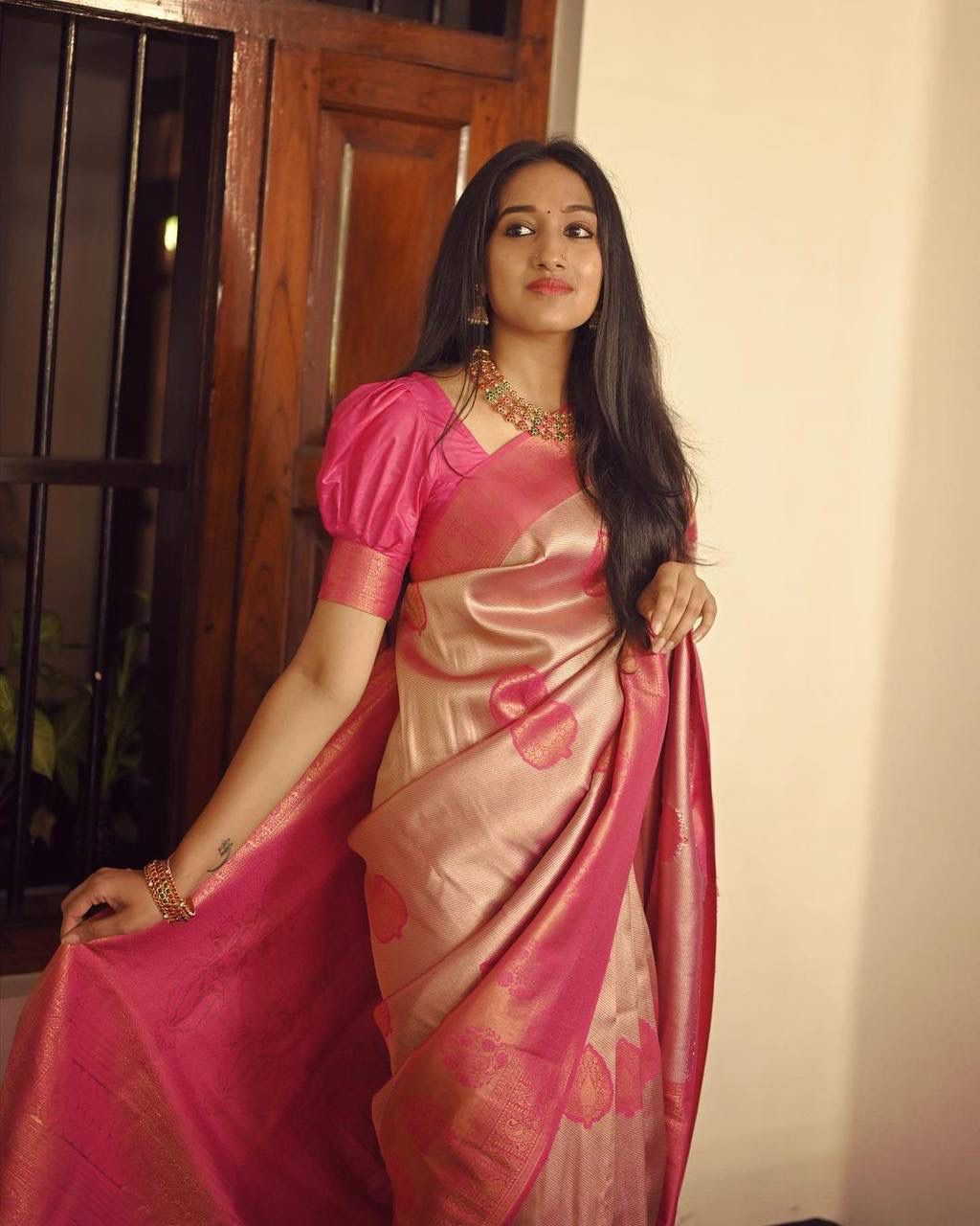 Flattering Peach Soft Silk Saree With Unique Blouse Piece