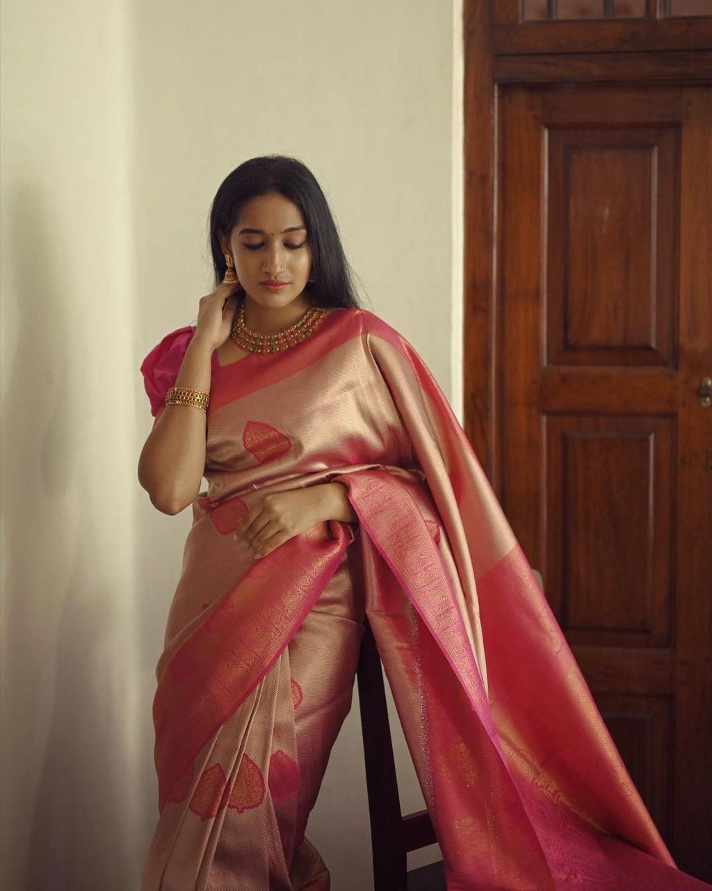 Flattering Peach Soft Silk Saree With Unique Blouse Piece