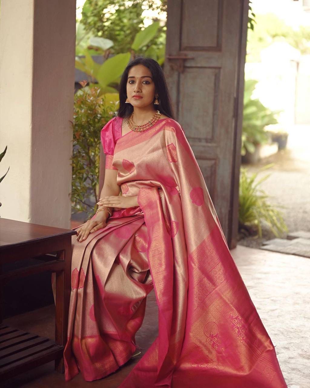 Flattering Peach Soft Silk Saree With Unique Blouse Piece