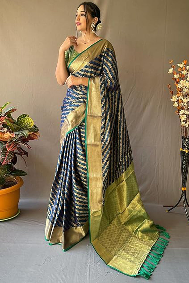 Prominent Navy Blue Soft Banarasi Silk Saree With Gleaming Blouse Piece