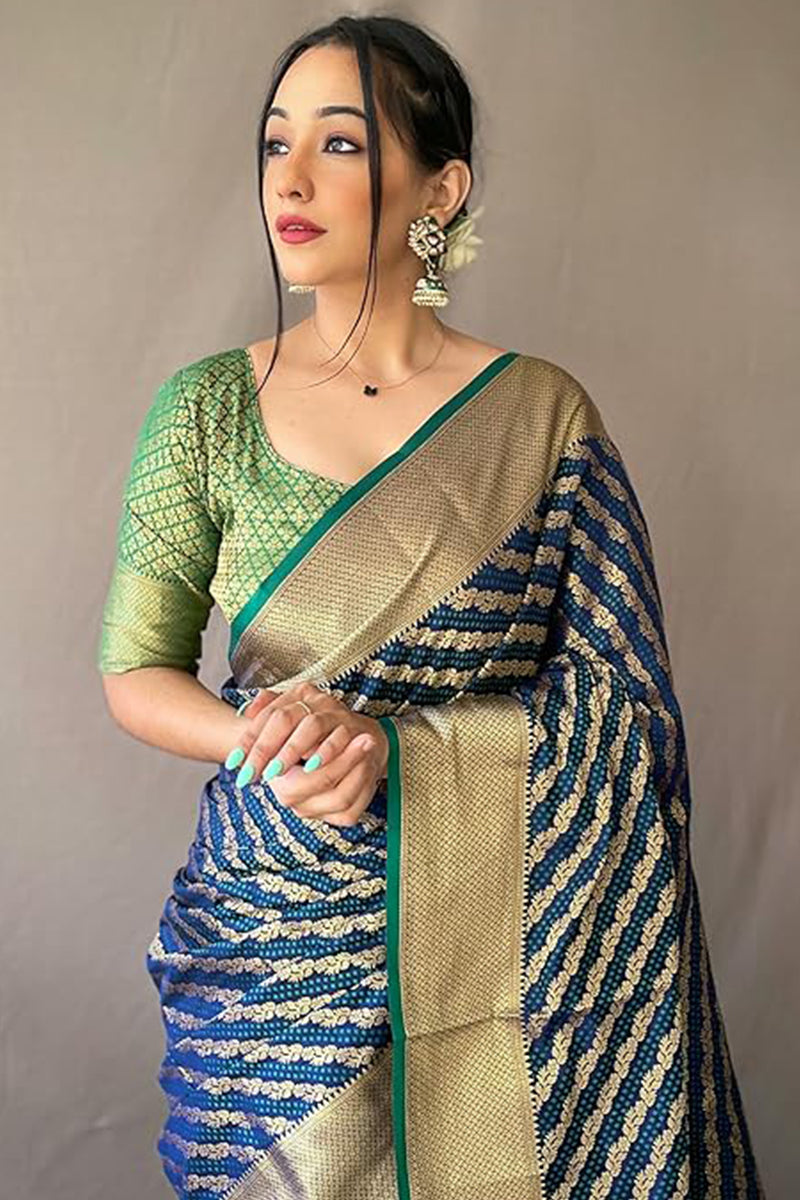 Prominent Navy Blue Soft Banarasi Silk Saree With Gleaming Blouse Piece