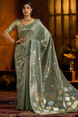 Murmurous Sea Green Soft Banarasi Tissue Silk Saree With Enticing Blouse Piece