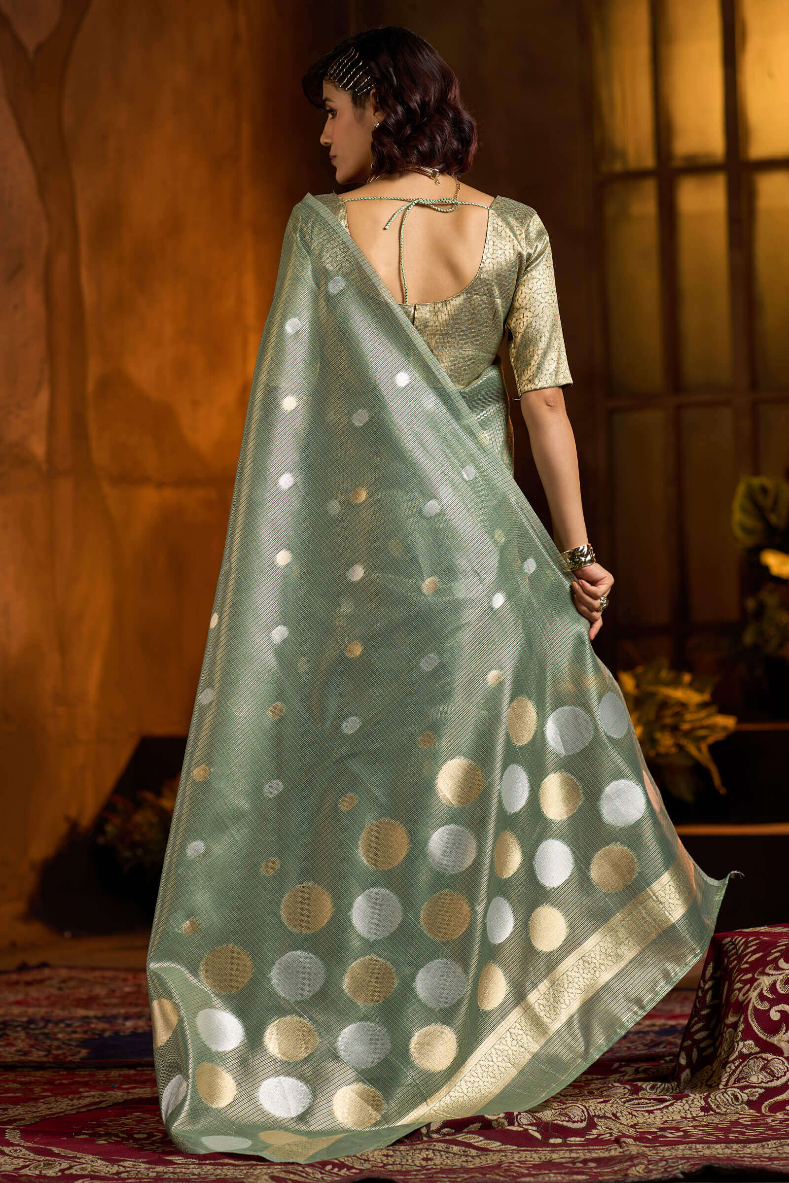 Murmurous Sea Green Soft Banarasi Tissue Silk Saree With Enticing Blouse Piece