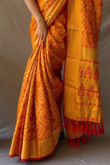 Jubilant Mustard Patola Silk Saree with Lovely Blouse Piece