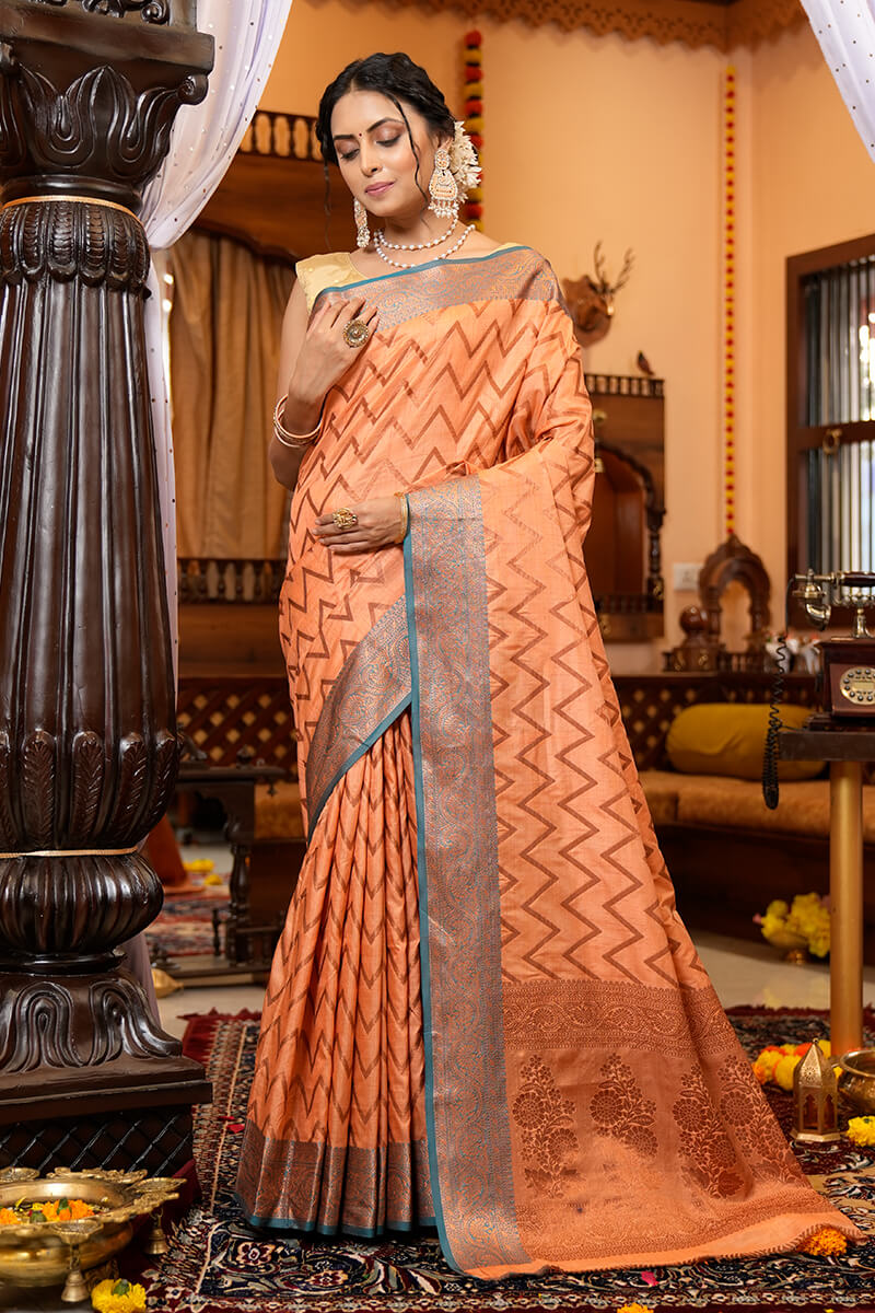Ideal Peach Soft Banarasi Silk Saree With Admirable Blouse Piece