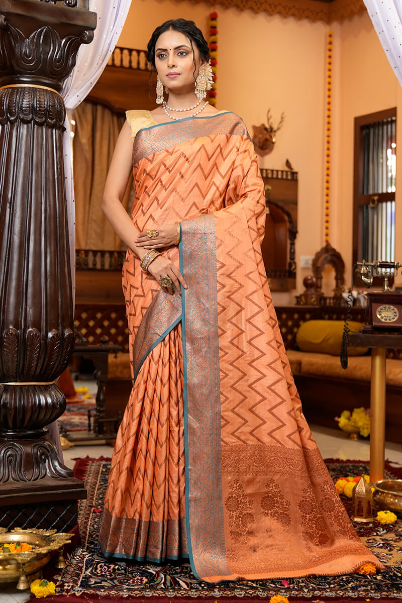 Ideal Peach Soft Banarasi Silk Saree With Admirable Blouse Piece