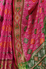 Vivacious Dark Pink Patola Silk Saree with Hypnotic Blouse Piece