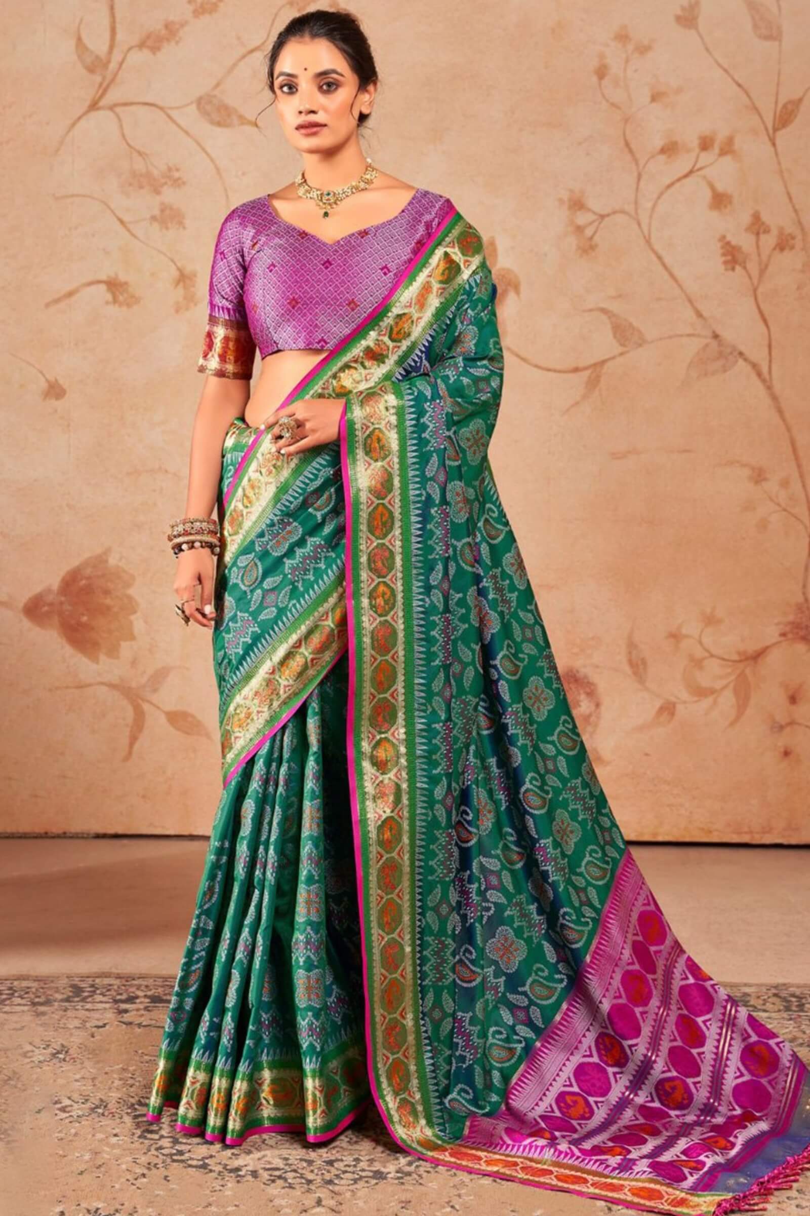 Murmurous Green Patola Silk Saree with Sophisticated Blouse Piece
