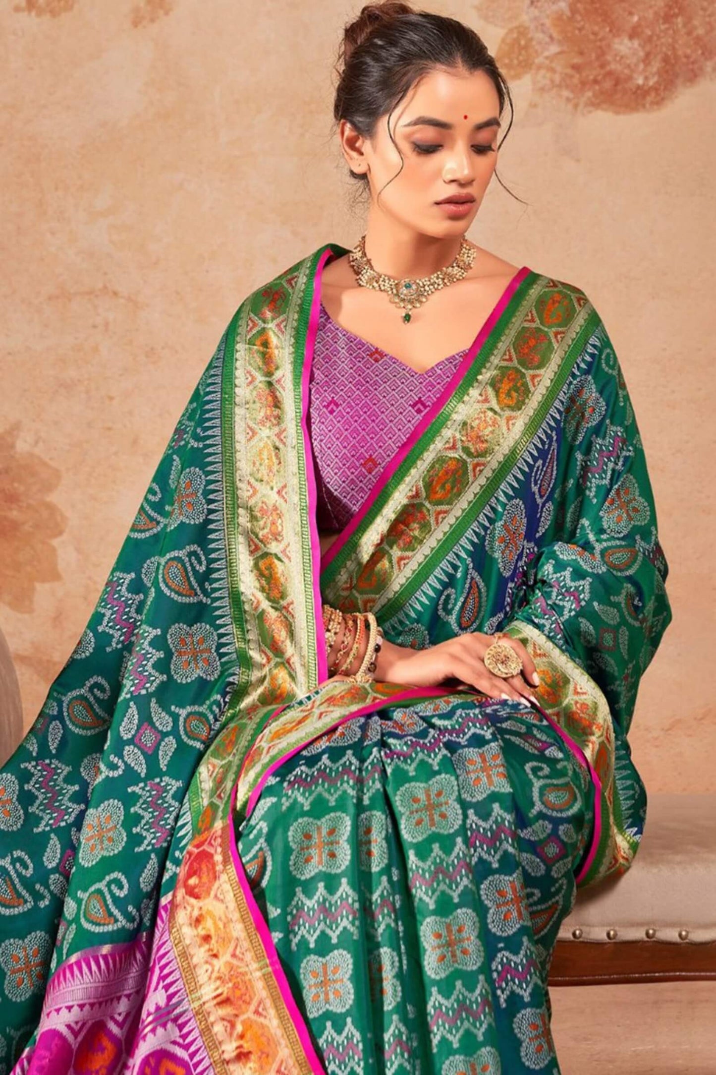 Murmurous Green Patola Silk Saree with Sophisticated Blouse Piece