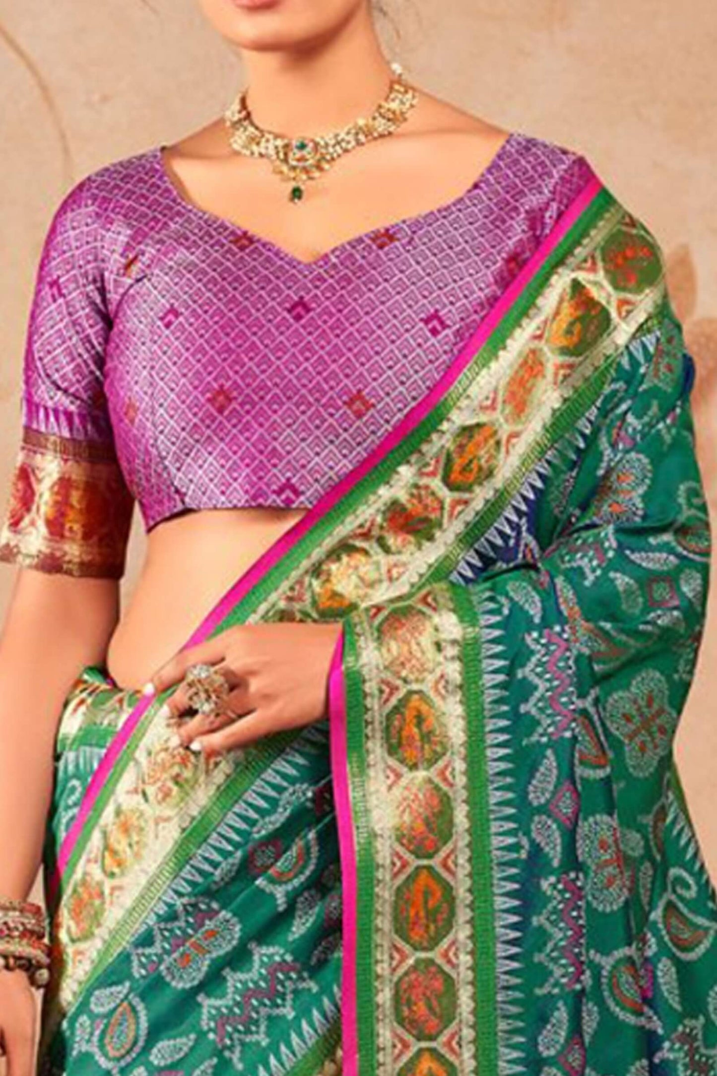 Murmurous Green Patola Silk Saree with Sophisticated Blouse Piece