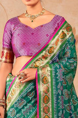 Murmurous Green Patola Silk Saree with Sophisticated Blouse Piece