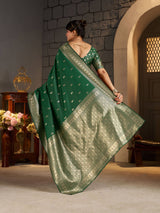Capricious Dark Green Banarasi Silk Saree With Glamorous Blouse Piece