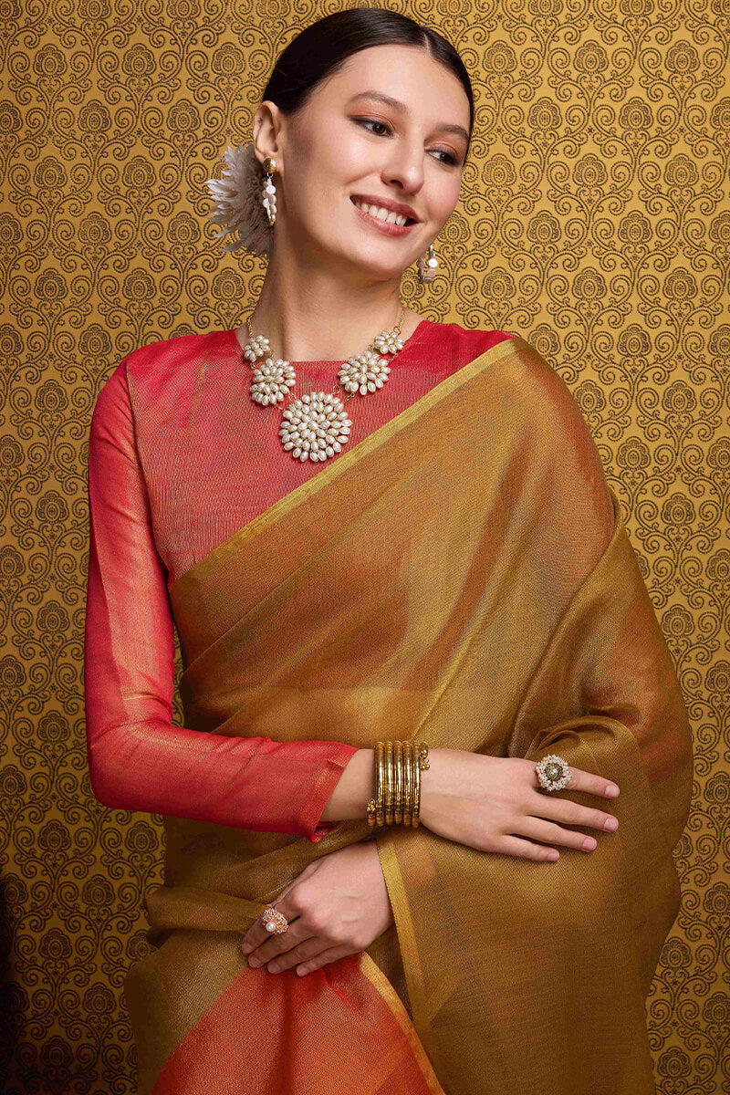 Rhapsodic Mustard Soft Banarasi Tissue Silk Saree With Surpassing Blouse Piece
