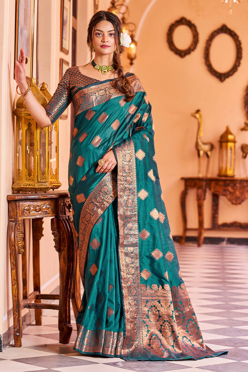 Twirling Rama Soft Banarasi Silk Saree With Entrancing Blouse Piece