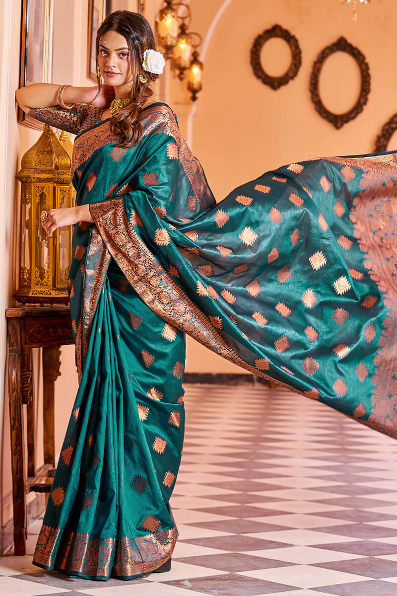 Twirling Rama Soft Banarasi Silk Saree With Entrancing Blouse Piece