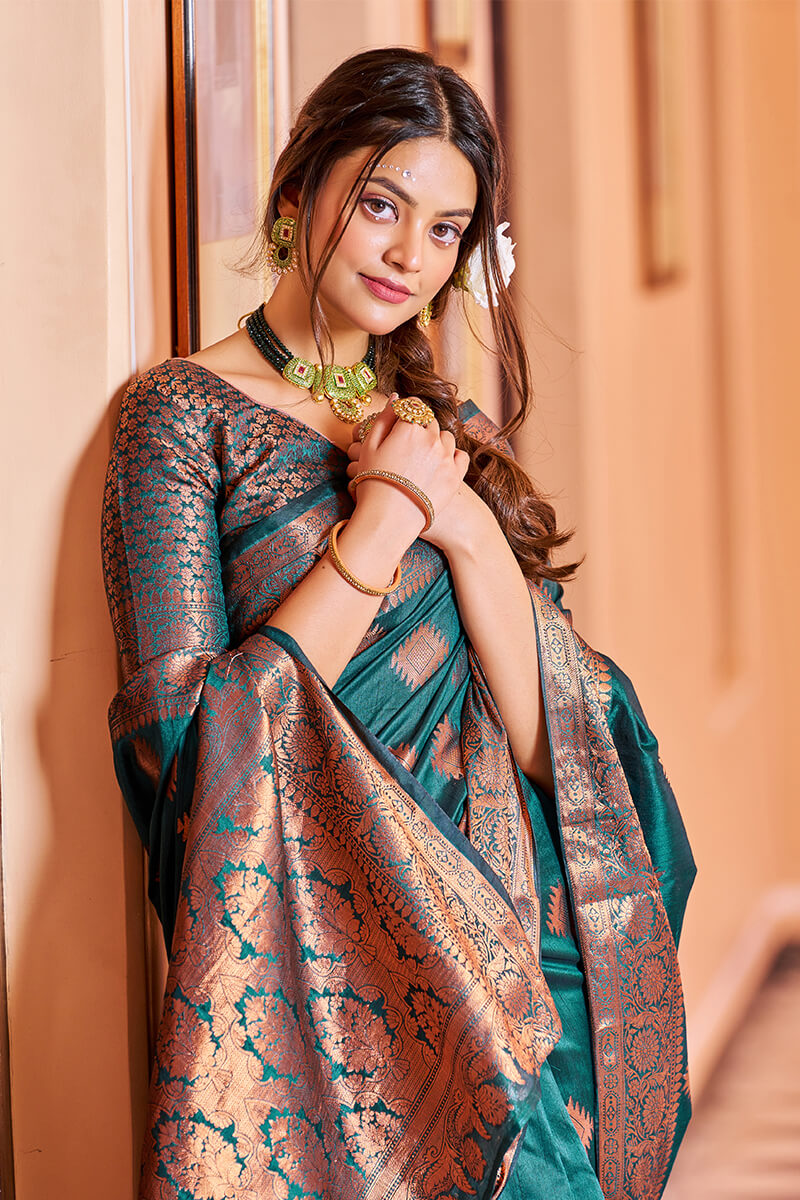 Twirling Rama Soft Banarasi Silk Saree With Entrancing Blouse Piece