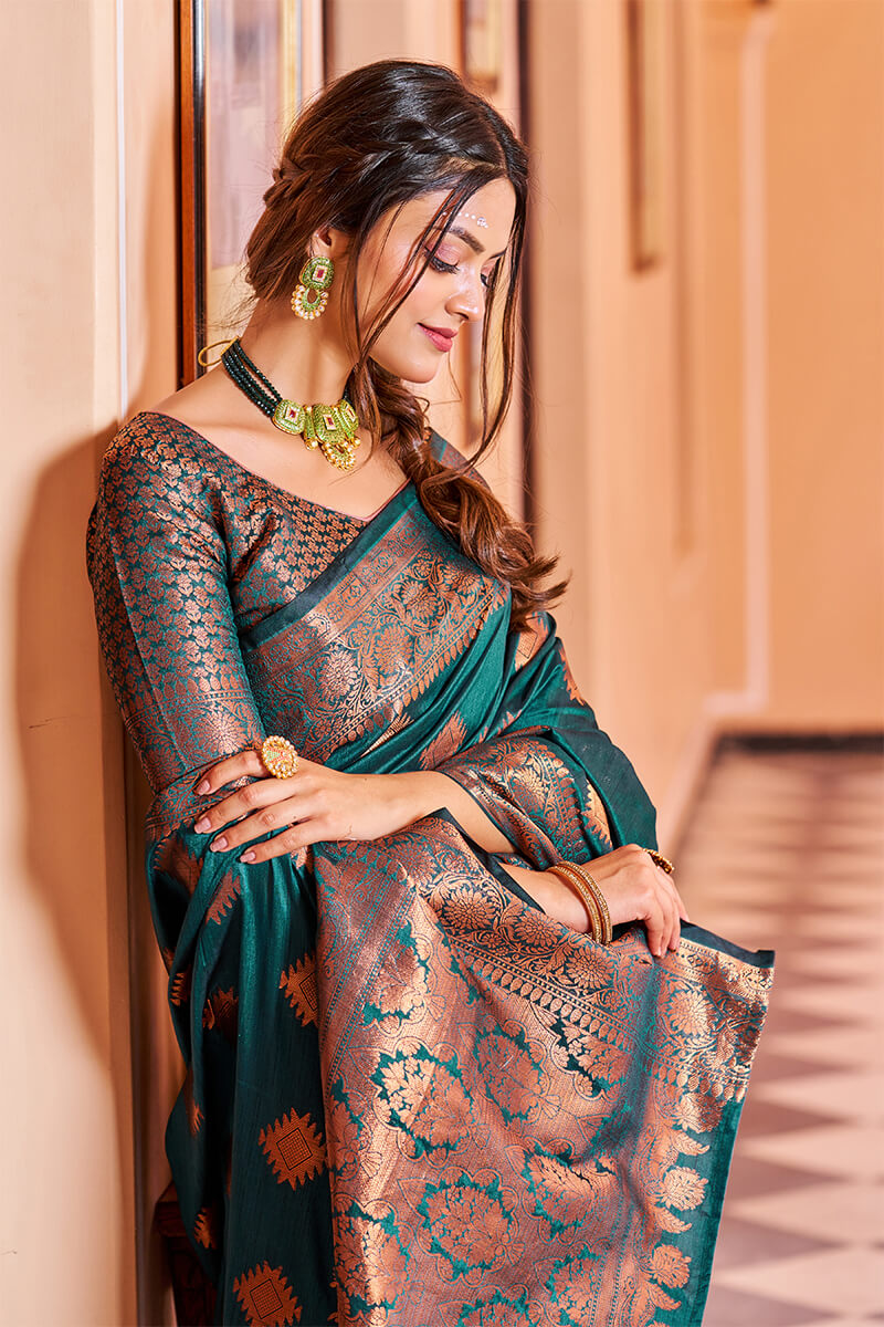 Twirling Rama Soft Banarasi Silk Saree With Entrancing Blouse Piece