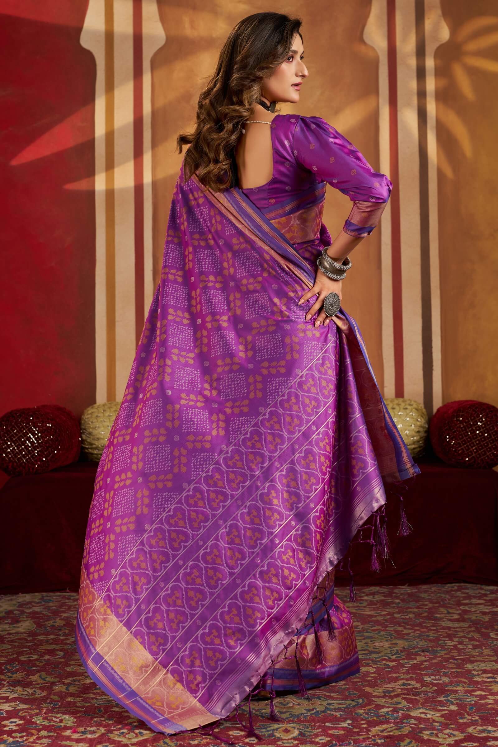Delectable Purple Patola Silk Saree with Adoring Blouse Piece