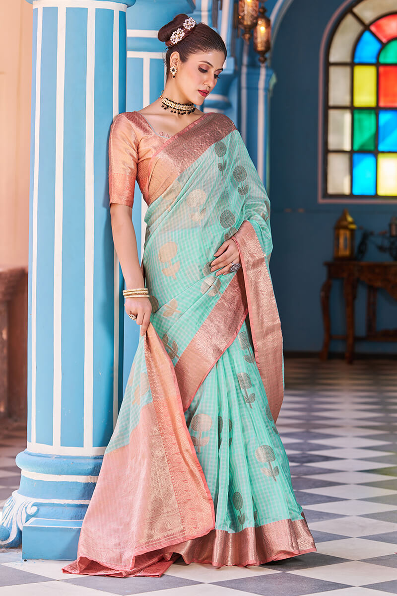 Luxuriant Sea Green Organza Silk Saree With Fantabulous Blouse Piece