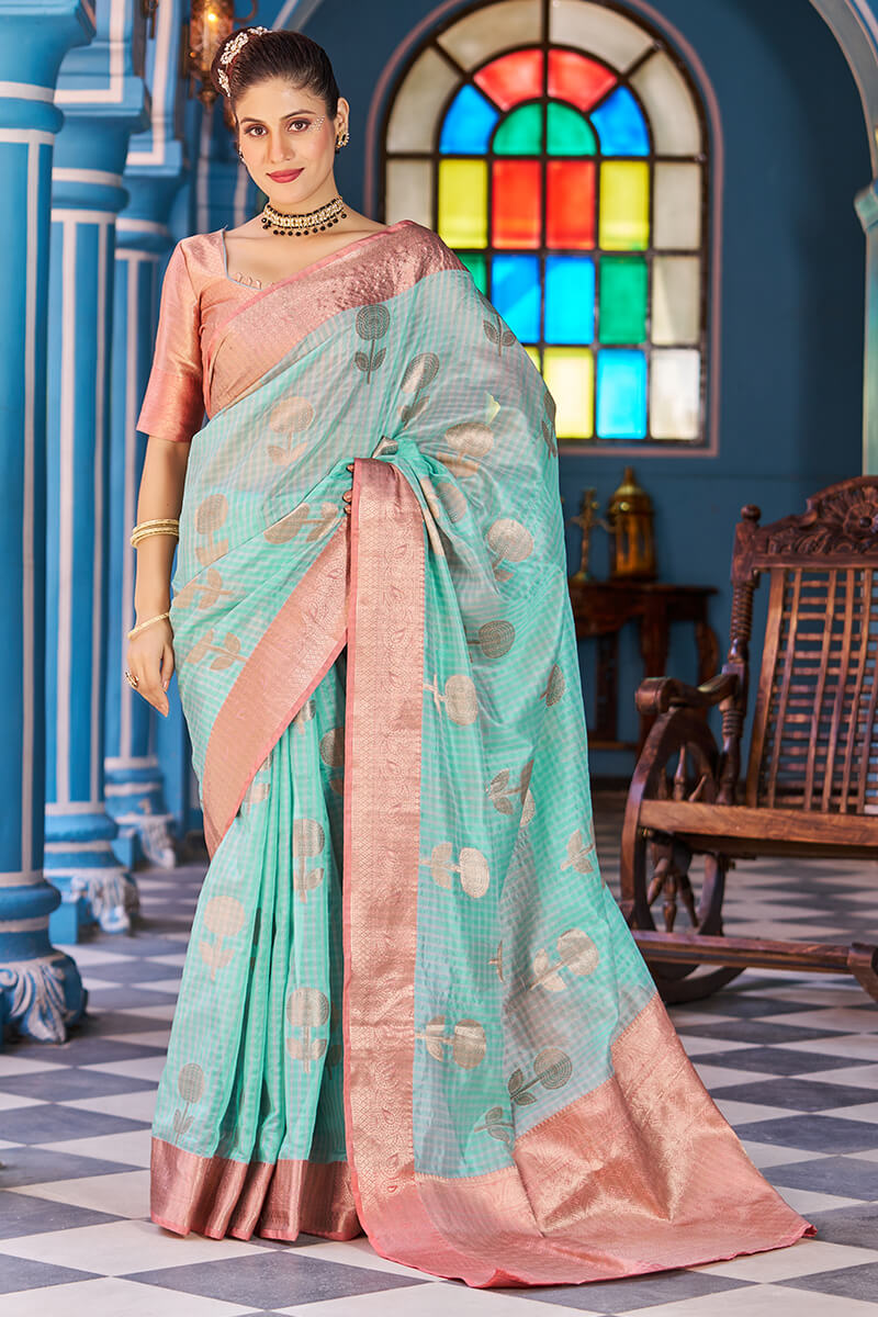 Luxuriant Sea Green Organza Silk Saree With Fantabulous Blouse Piece