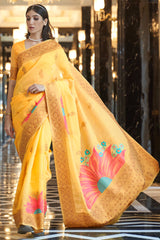 Pretty Yellow Cotton Silk Saree With Gleaming Blouse Piece