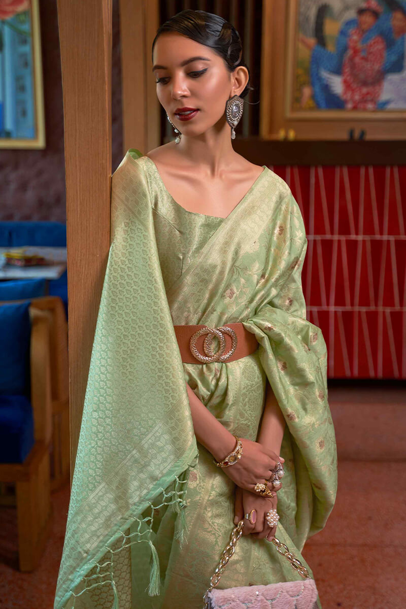 Surpassing Pista Soft Banarasi Silk Saree With Exceptional Blouse Piece