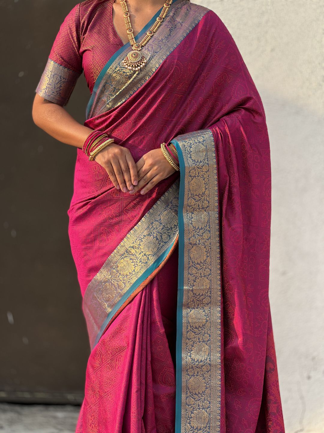 Dark pink soft patola silk saree with bandhani weaves zari border