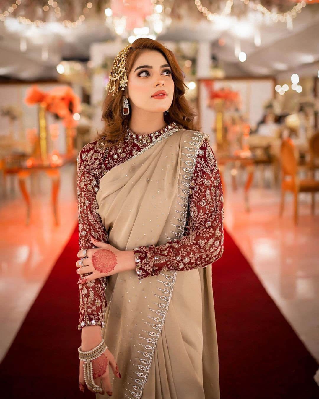 Beige Saree in Georgette With Heavy Embroidery And Maroon Blouse