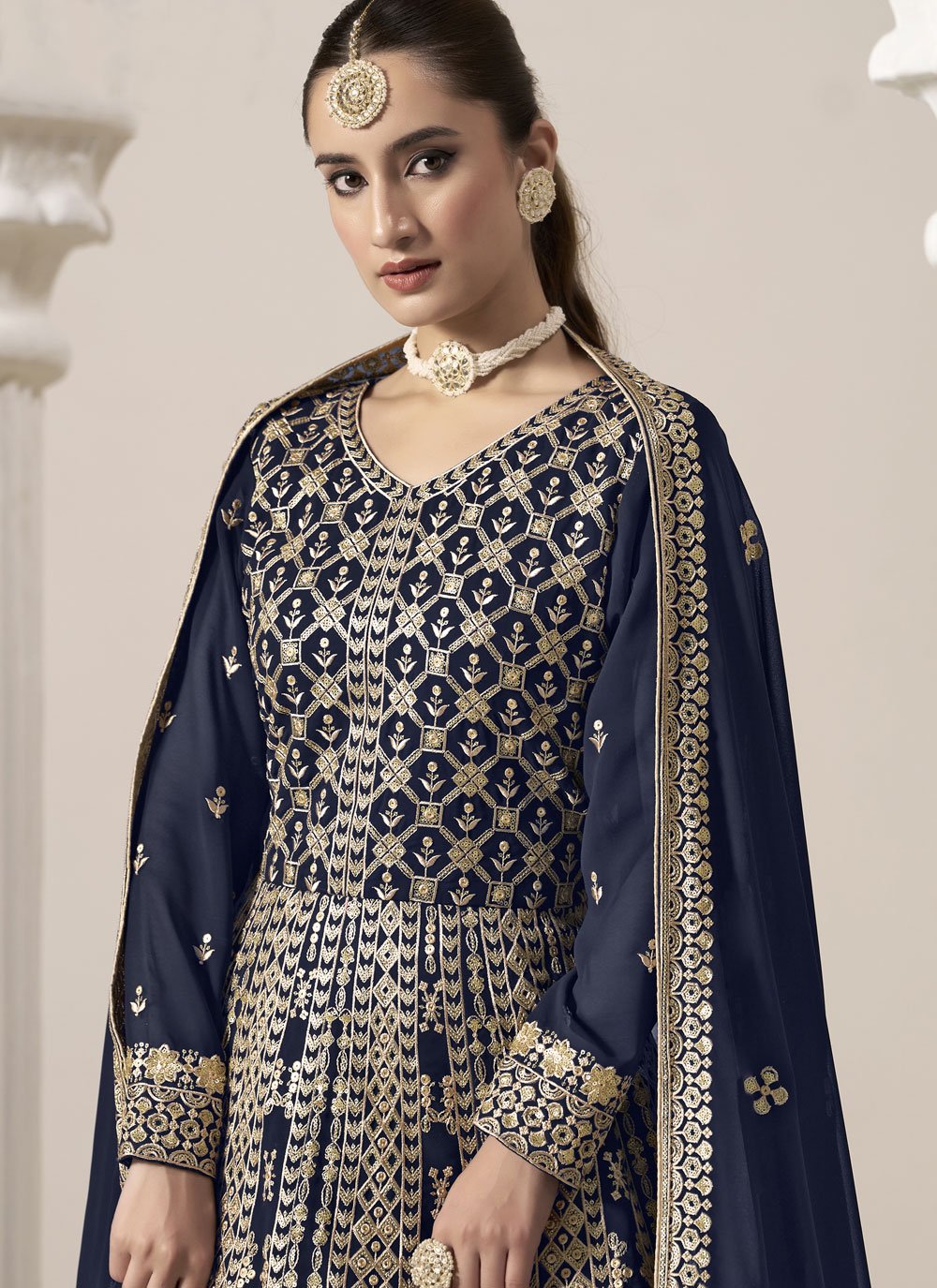 Graceful blue faux georgette anarkali suit with intricate embroidery