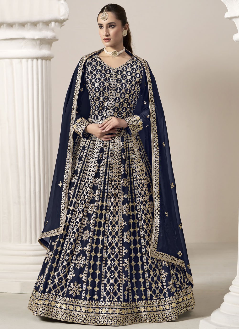 Graceful blue faux georgette anarkali suit with intricate embroidery