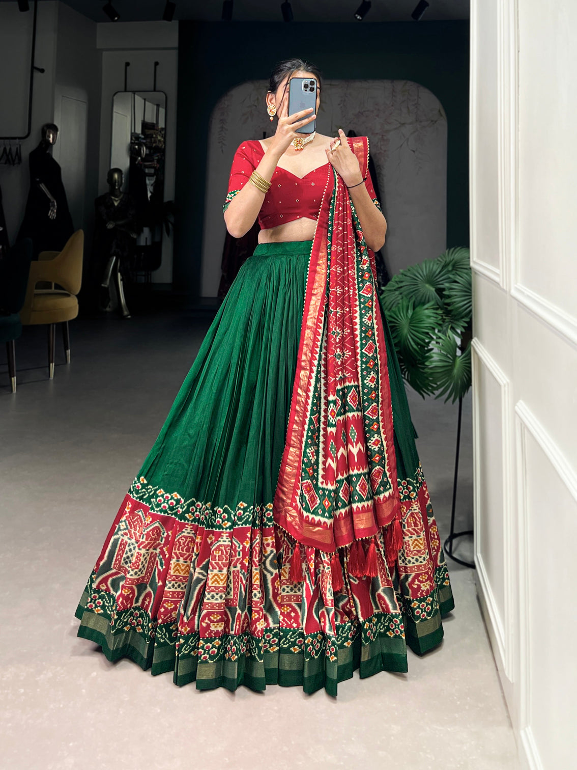 Ethnic Green & Red Lehenga Choli with Tassels & Patola Print