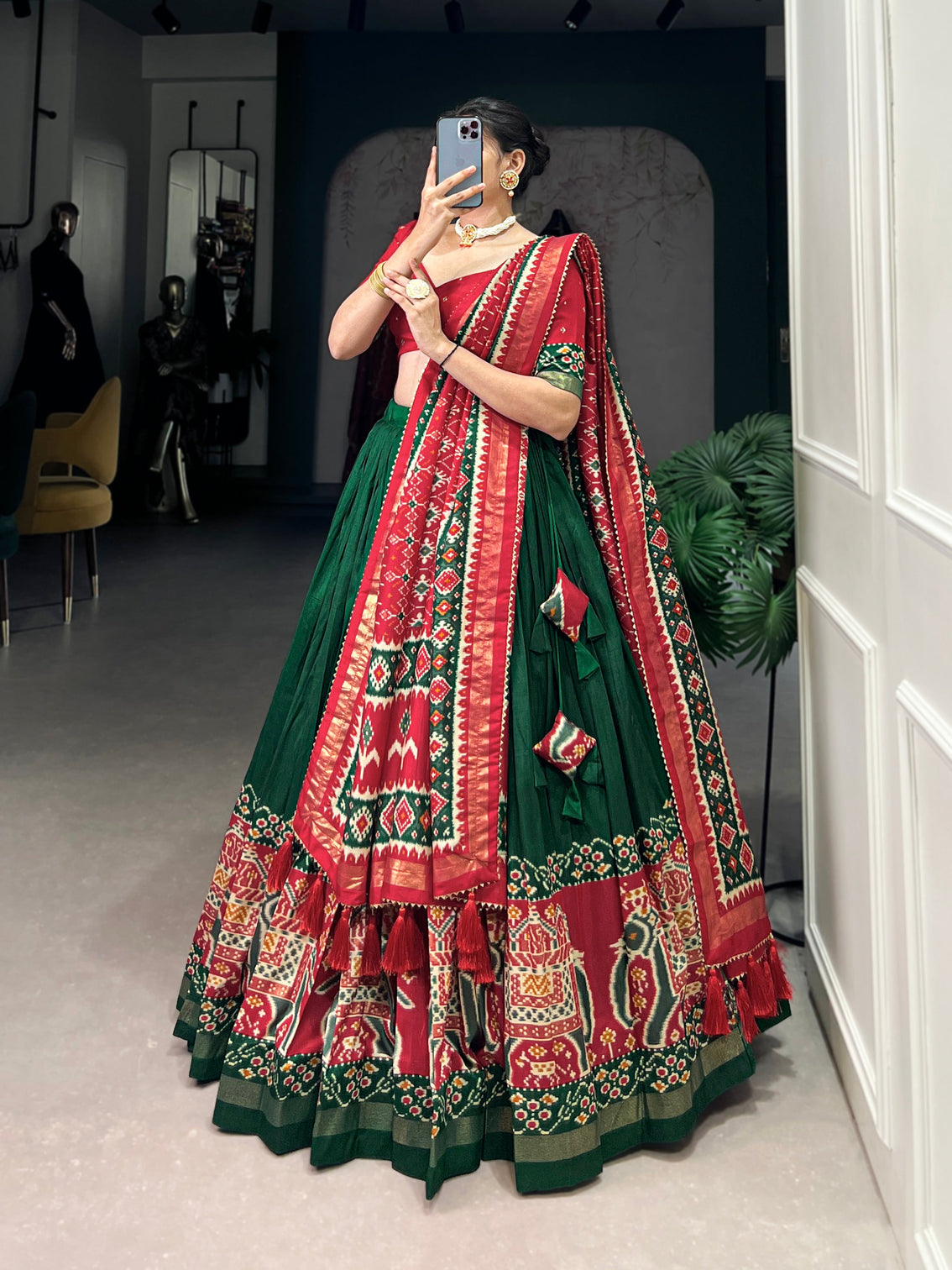Ethnic Green & Red Lehenga Choli with Tassels & Patola Print