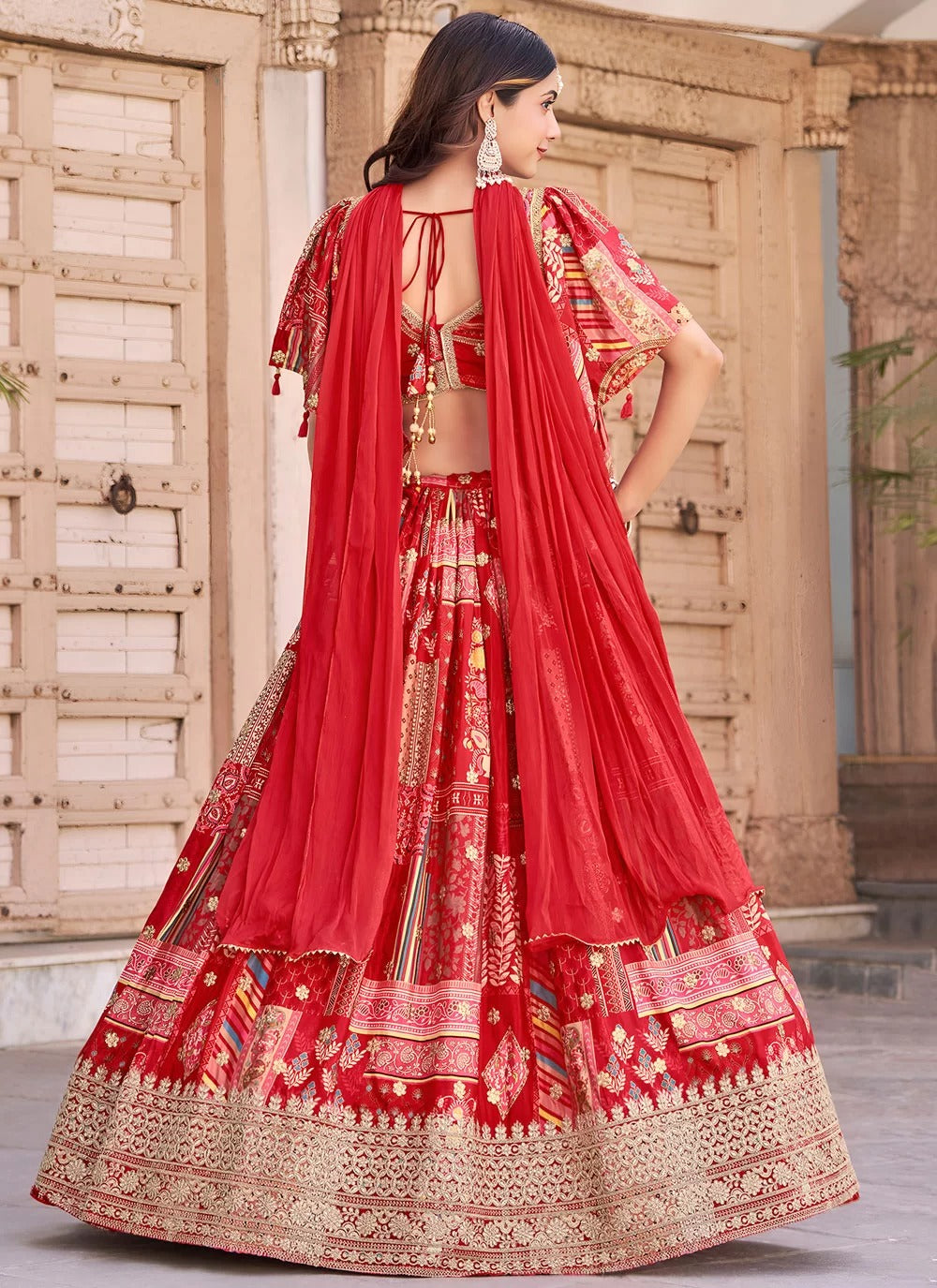 Charming red chinnon silk embroidered lehenga choli for engagement with chiffon dupatta