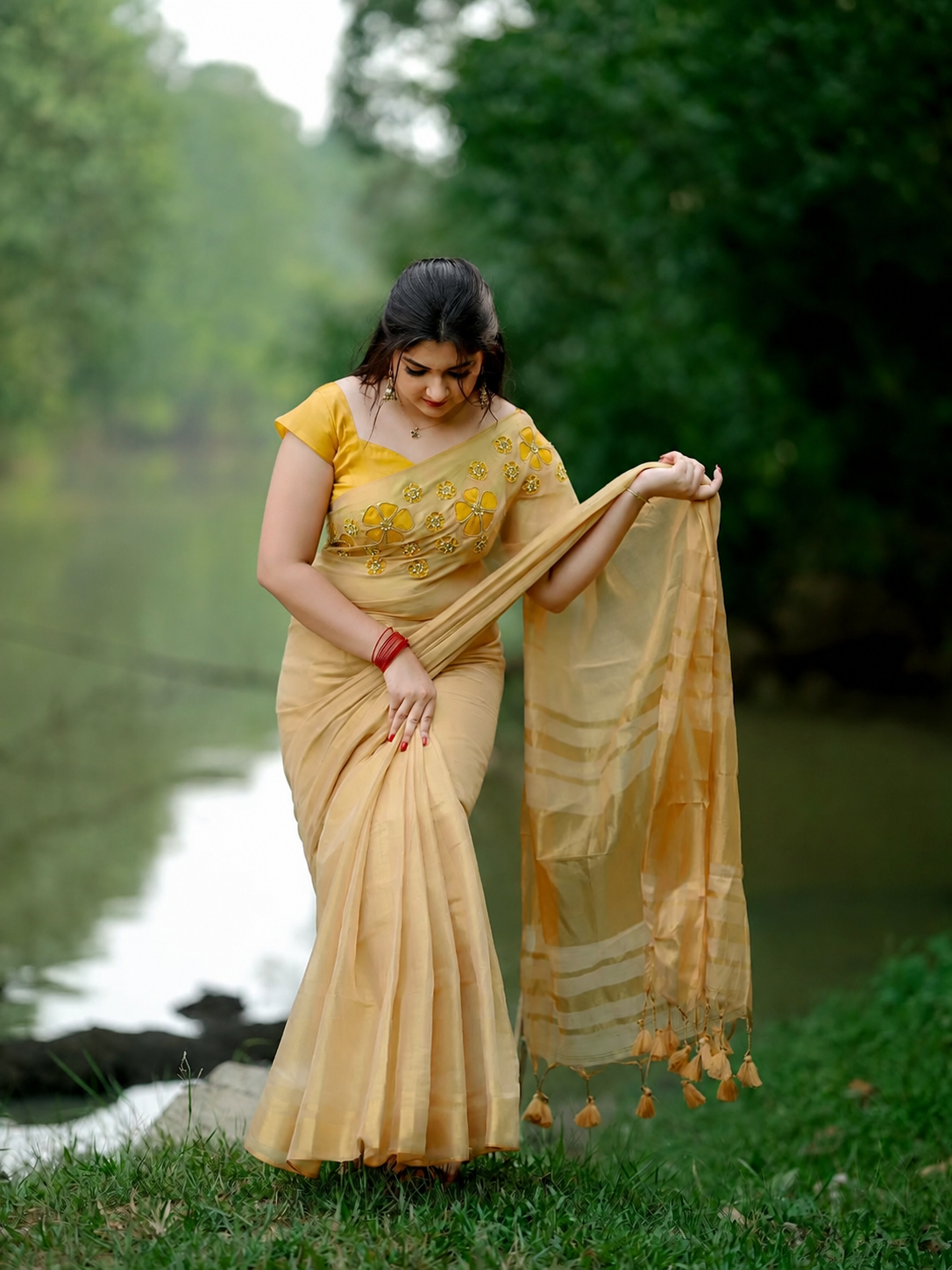 Golden tissue handwork saree with designer floral blouse