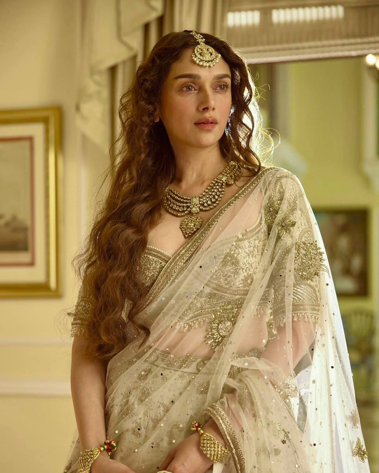 Cream Heavy Slub Silk Lehenga with Sequins, Dori & Zari Work, Matching Blouse & Net Dupatta