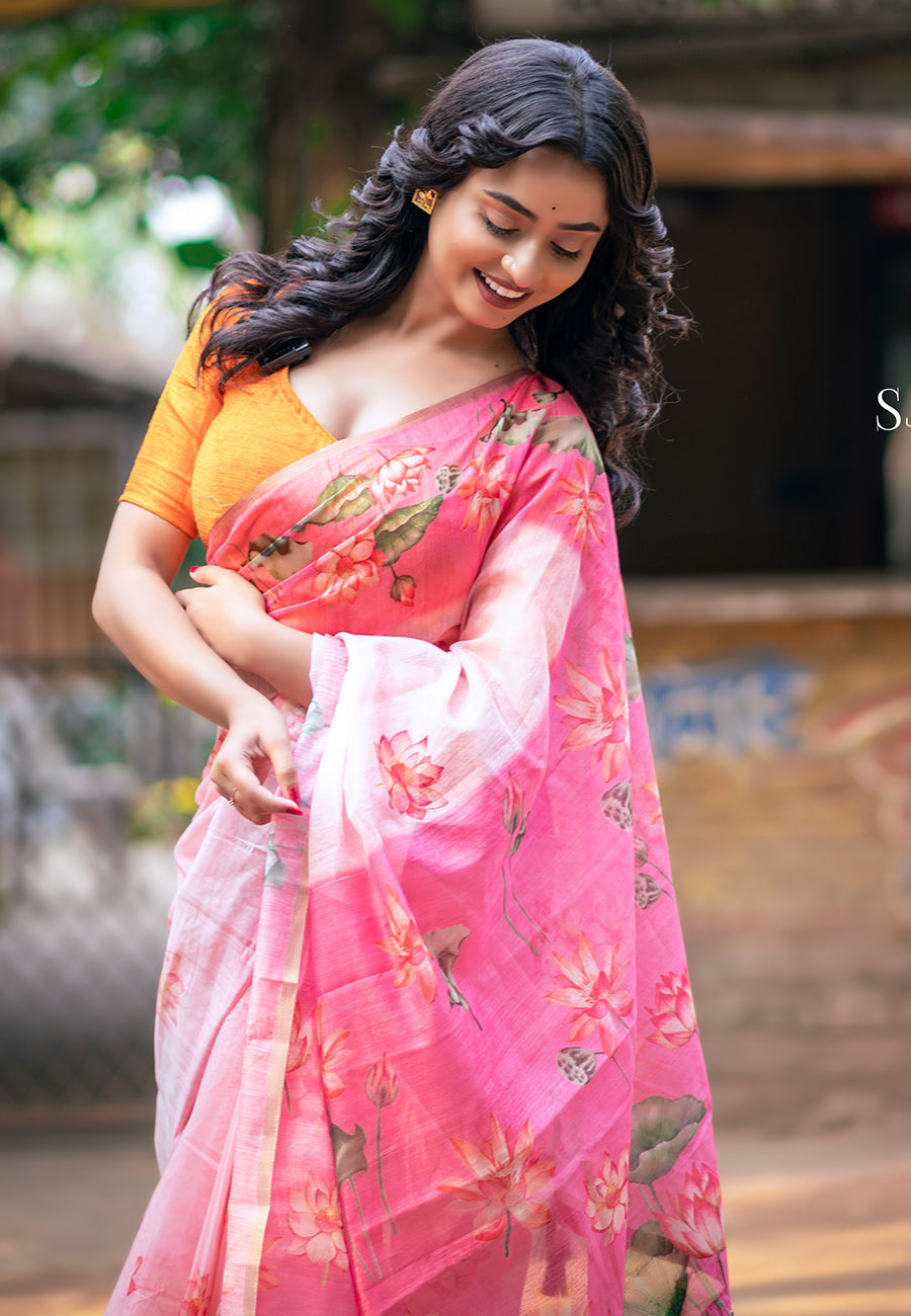 Dory in our baby pink chanderi cotton pichwai printed saree with zari woven border