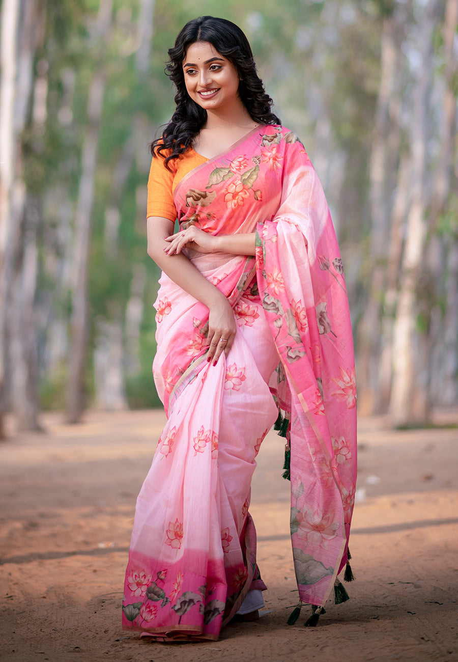 Dory in our baby pink chanderi cotton pichwai printed saree with zari woven border