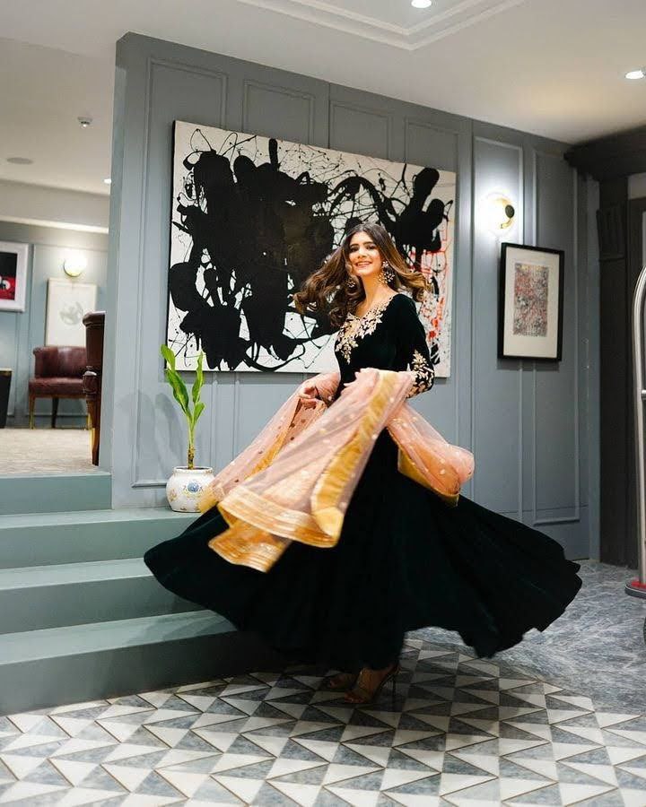 Dark Green Anarkali Gown in Velvet with Embroidery Work
