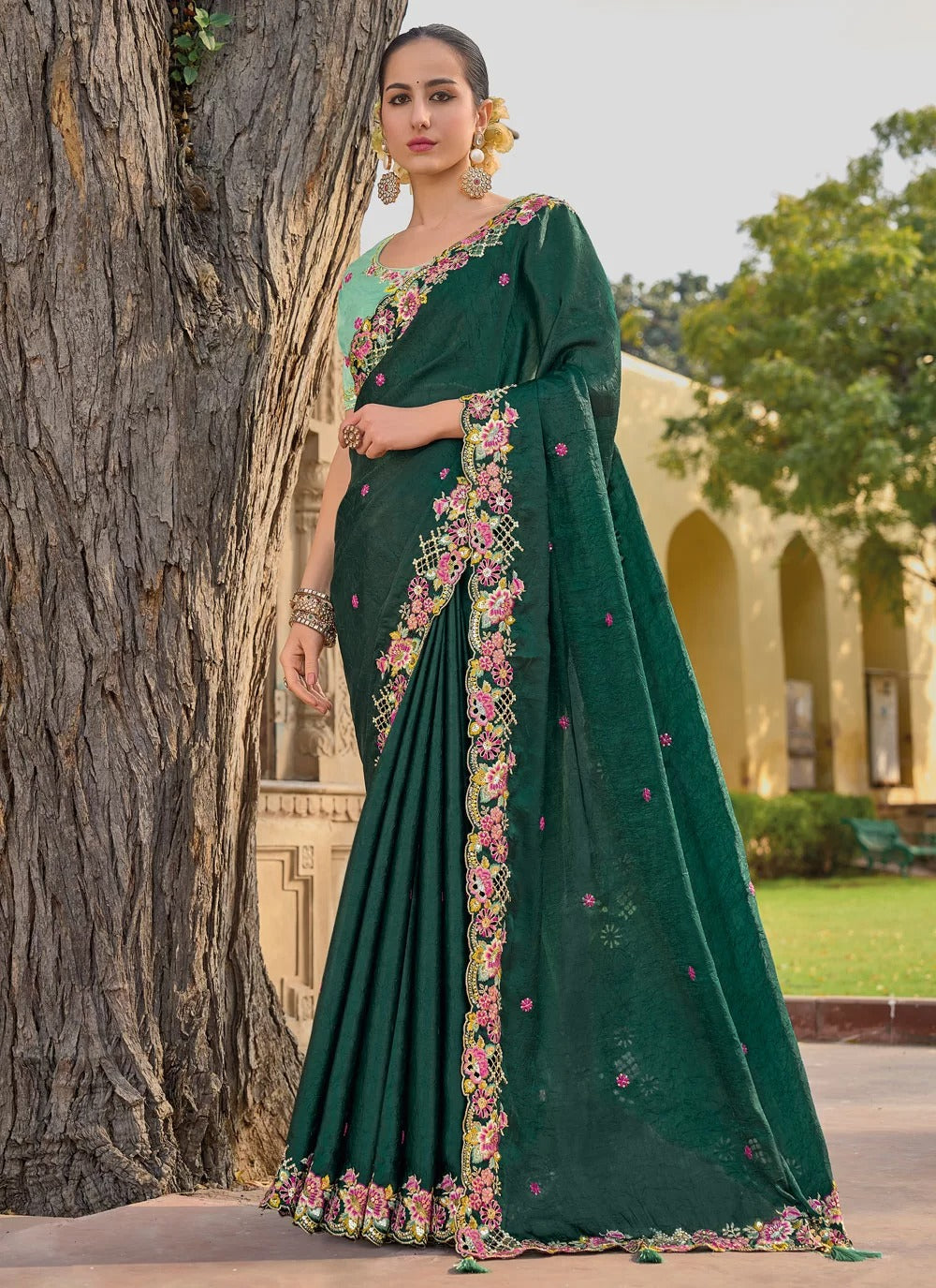 Charming green organza silk saree with embroidery stone sequence work