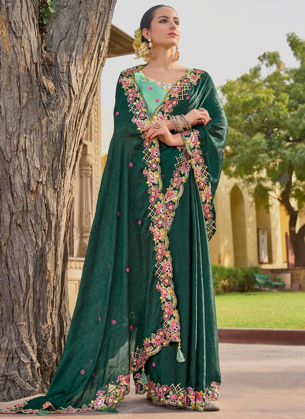 Charming green organza silk saree with embroidery stone sequence work