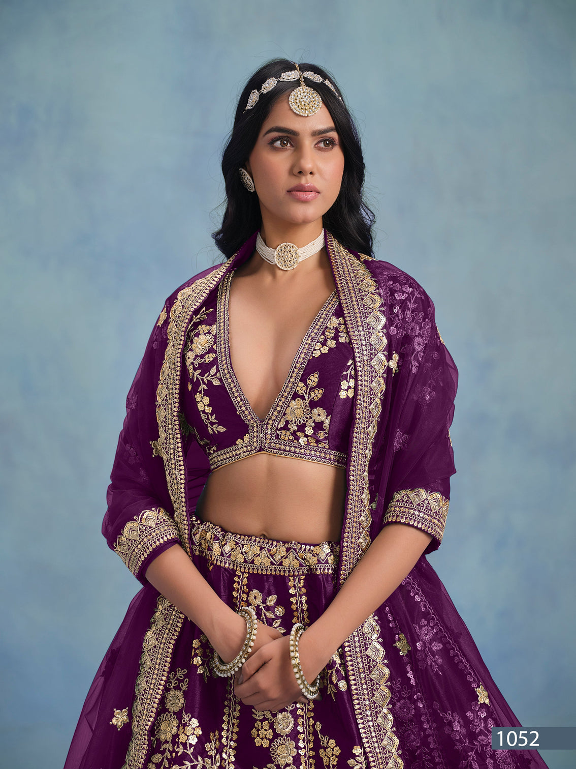 Blooming purple embroidered art silk bridesmaid lehenga with net dupatta