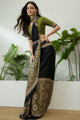 Denouement Black Ajrakh Printed Semi Modal Silk Saree With Splendorous Blouse Piece