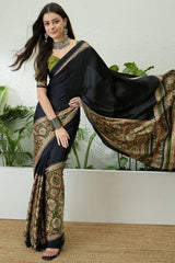 Denouement Black Ajrakh Printed Semi Modal Silk Saree With Splendorous Blouse Piece
