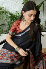 Marvellous Black Ajrakh Printed Semi Modal Silk Saree With Gratifying Blouse Piece