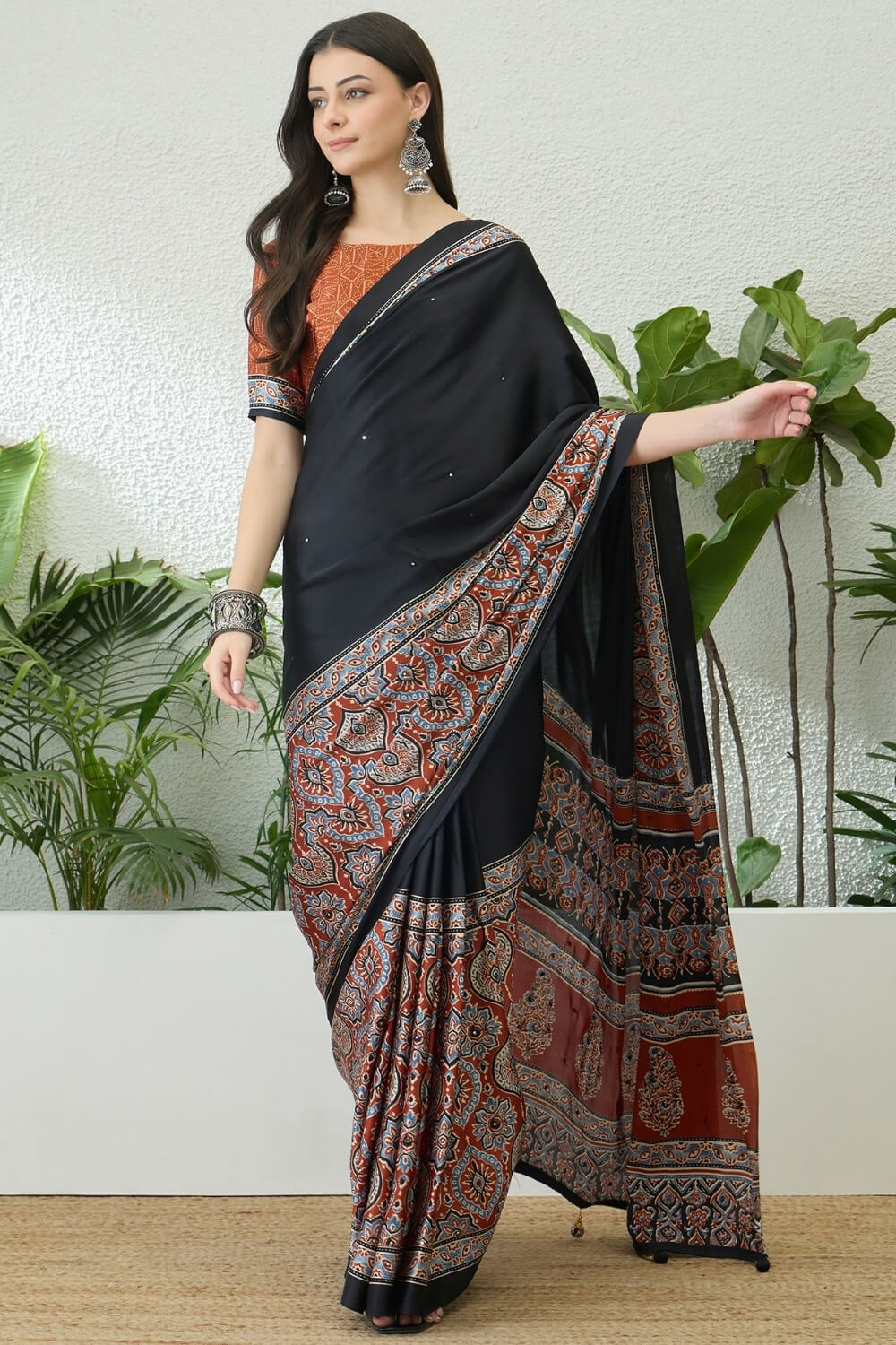 Invaluable Black Ajrakh Printed Semi Modal Silk Saree With Jazzy Blouse Piece